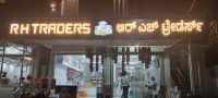 R H Traders logo